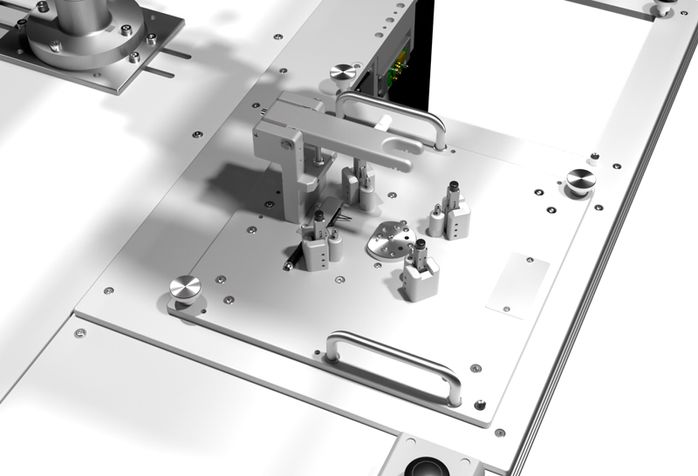 Plug-and-Produce - interchangeable mounting fixtures with automatic contacting